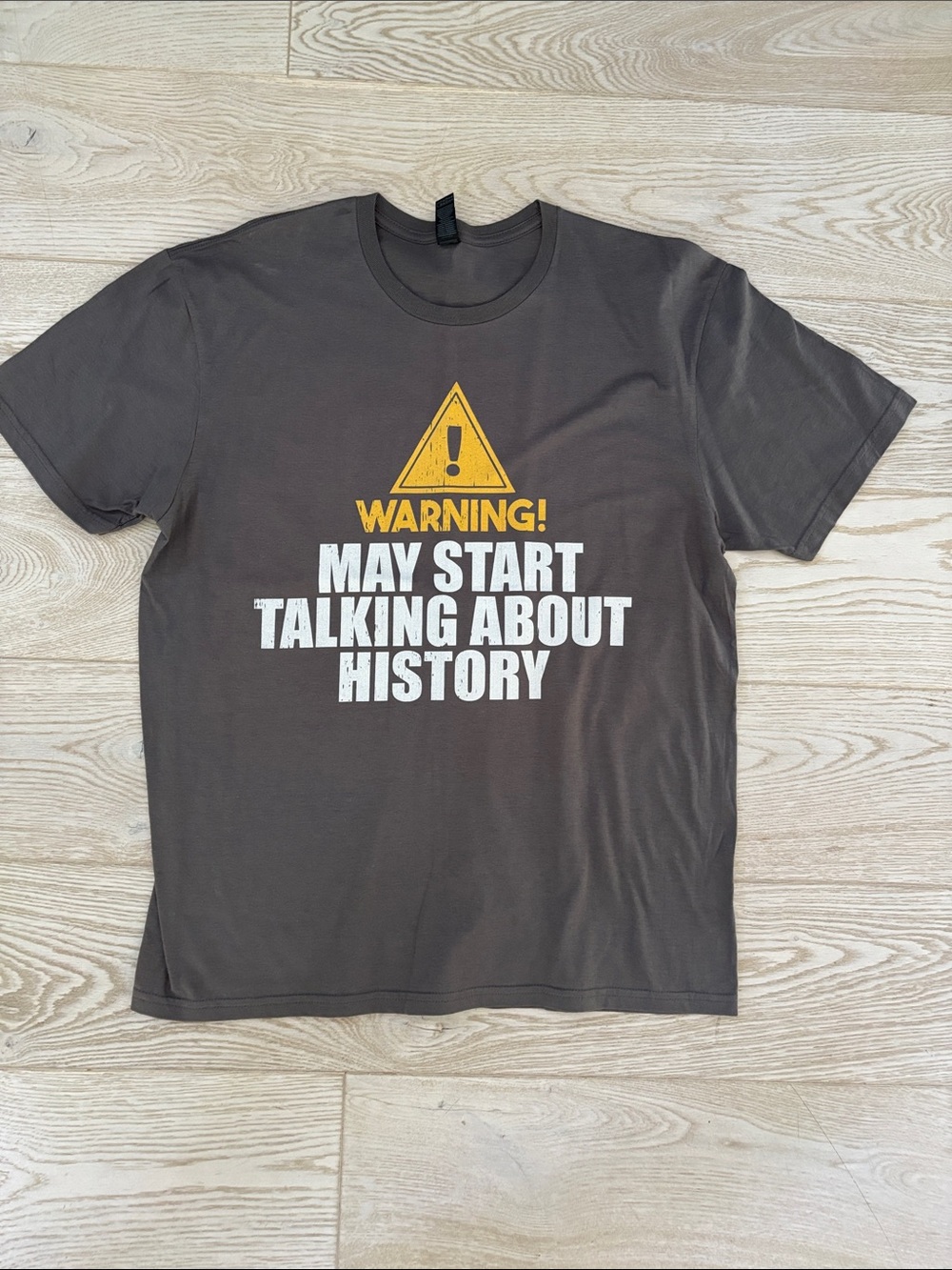 Men’s size large never worn tee.